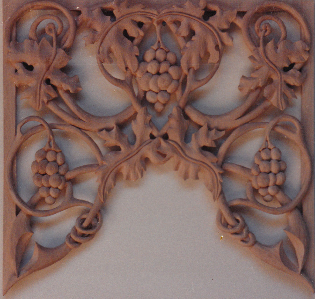Carved grapes and leaves in pipe shades for the Schlicker pipe organ, Wisconsin Lutheran College, Wisconsin WI, Schlicker Organ Co. 
